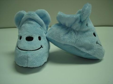 Plush animal slippers